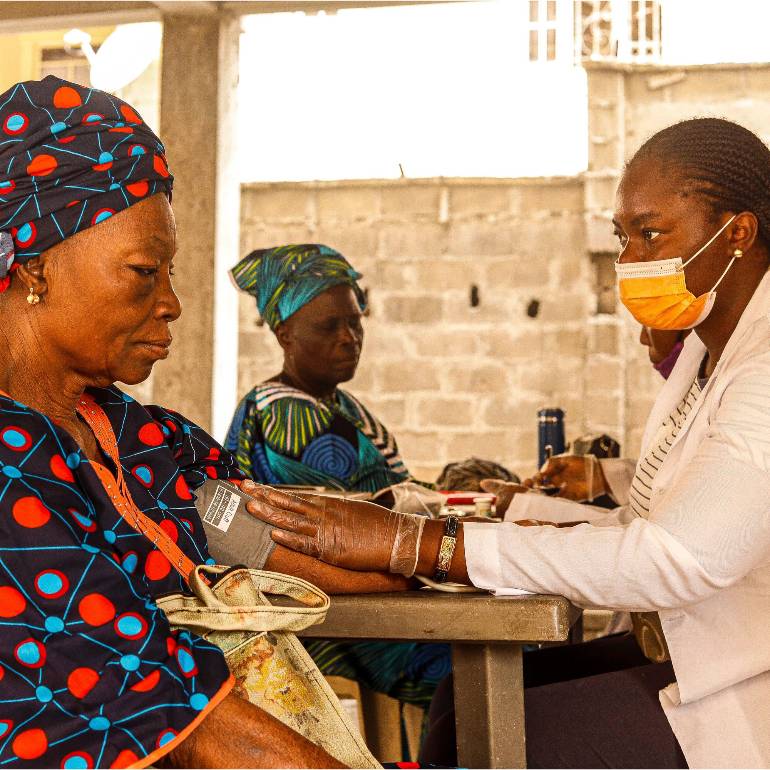 doctor helping patient India